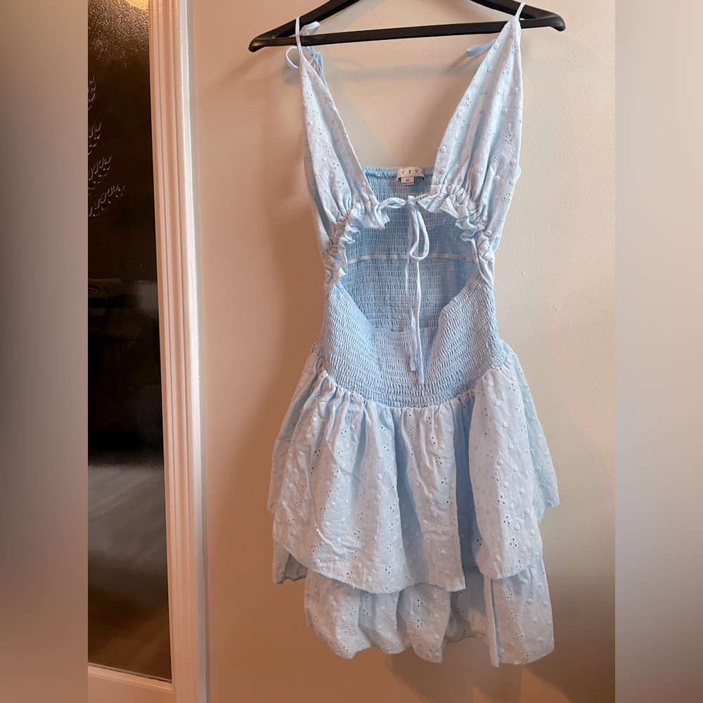 Boutique light blue ruffle dress with middle cutout womens M